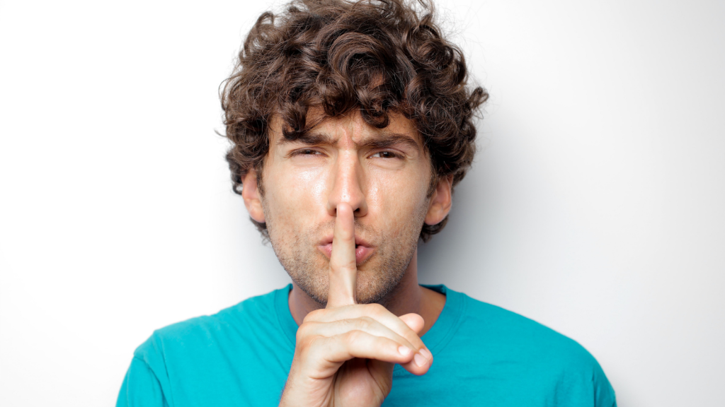 A guy shushing
