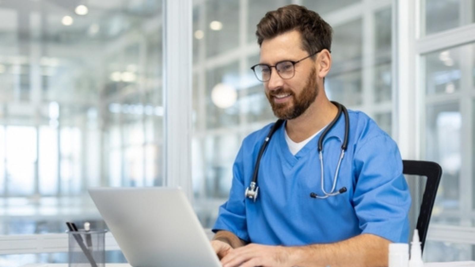 A New Customer Called Support After Messing Up His Payroll Software, And He Needed The Mistake Fixed Before His Employees Went Without Pay Doctor at computer
