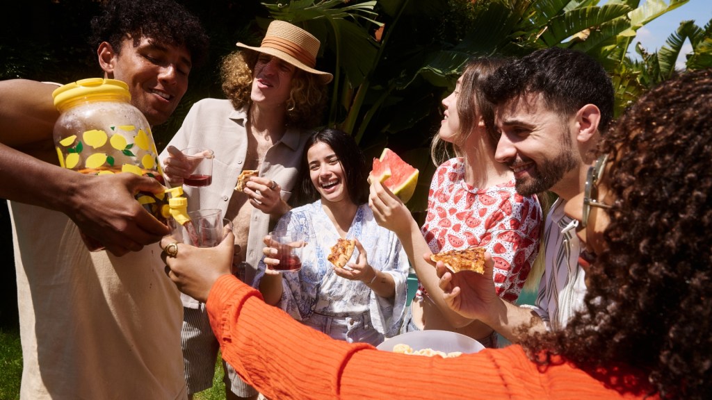 Group of neighbors enjoying their end of summer block party
