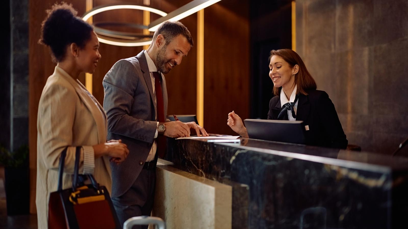 Hotel guests checking in