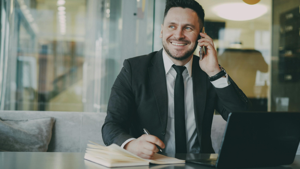Employees Kept Getting Pulled Into Unnecessary Meetings — And Crucial Work Started Falling Through the Cracks Man in the office talking on call