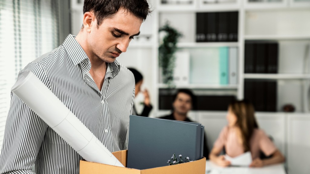 Workers Job Suffered During An Unimaginable Family Tragedy, But Management Ultimately Let Him Go Man taking out his belongings after being fired