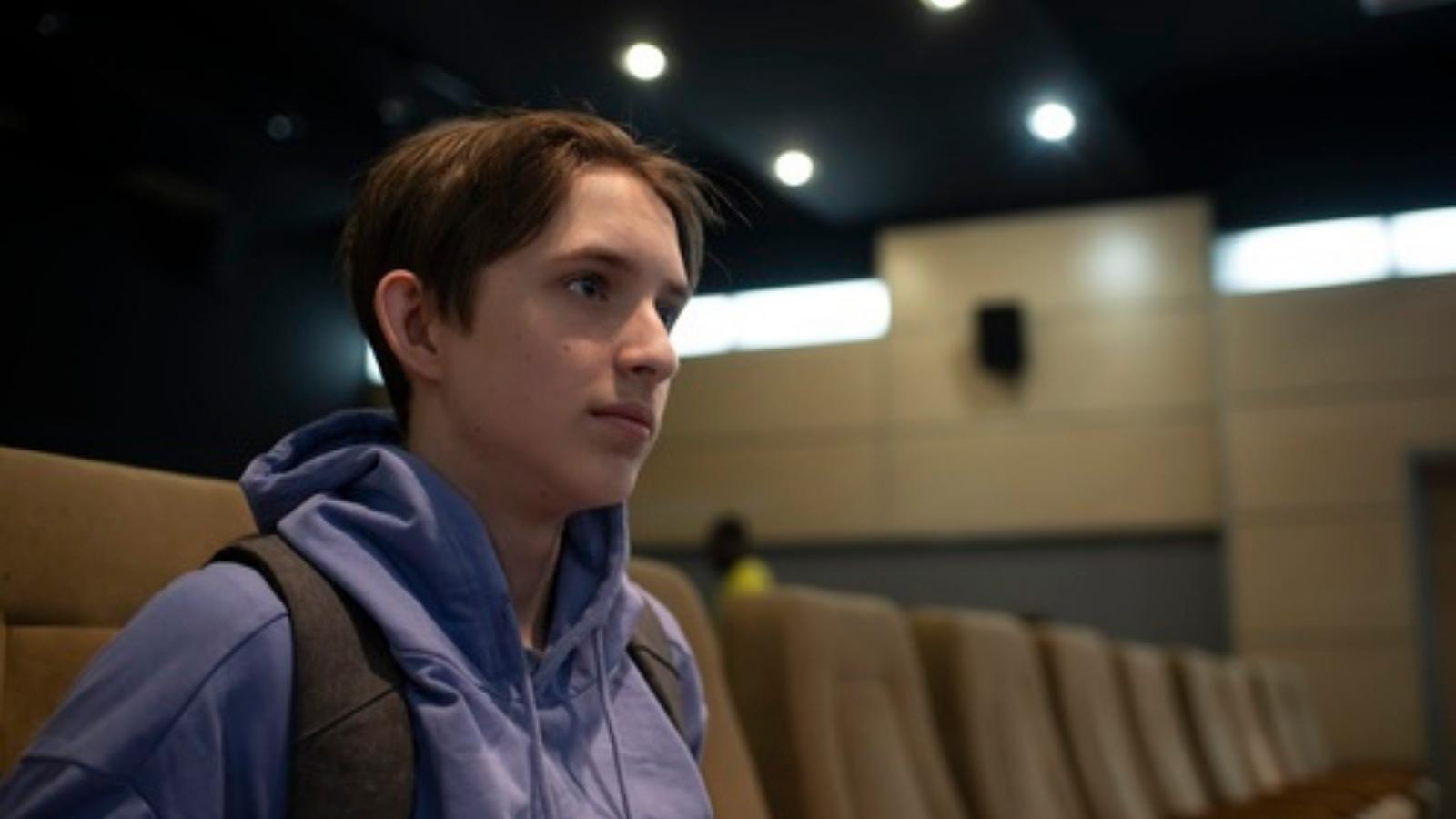 Teen at a movie