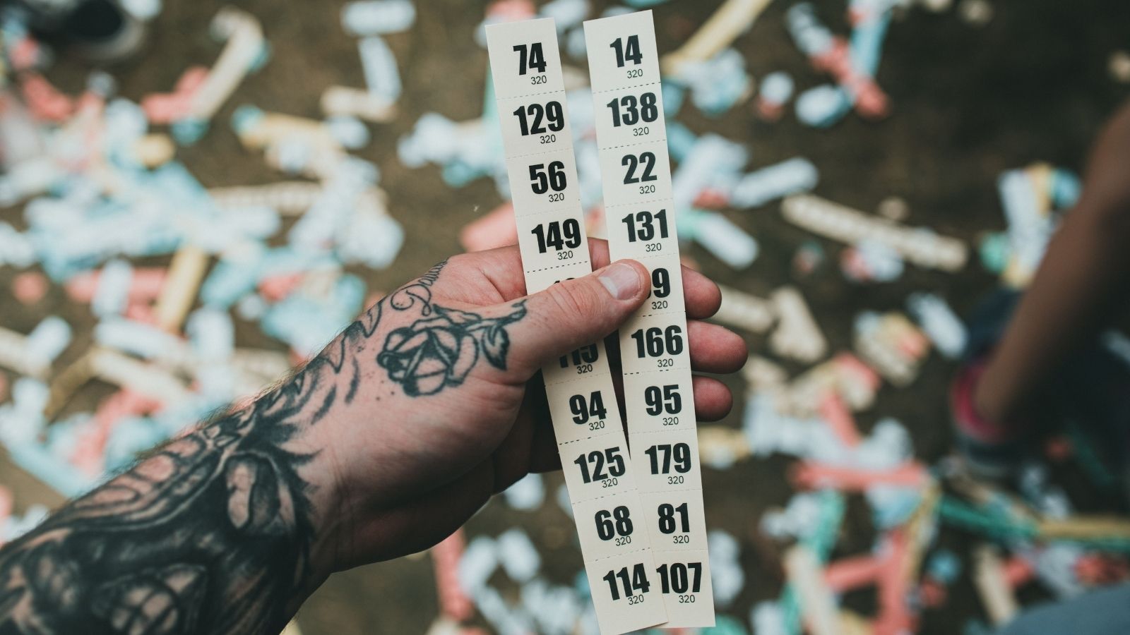 Man holding raffle tickets