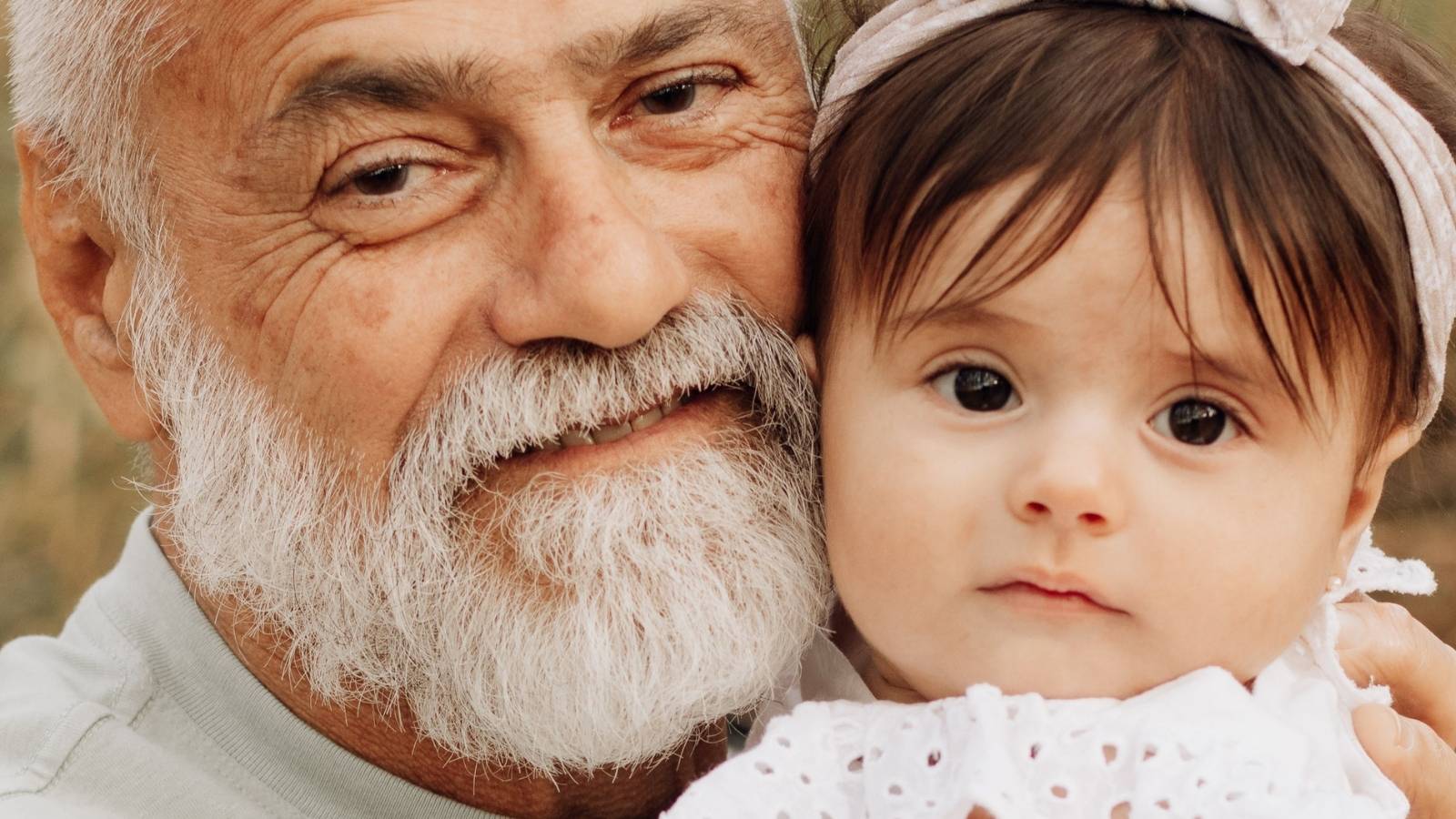 A Dad Told His Father to Stop Forcing an 18 Month Old to Call Him Papa—But the Grandfather Defied Him and Claimed He Has the Right to Choose His Own Name A grandfather holding his young granddaughter