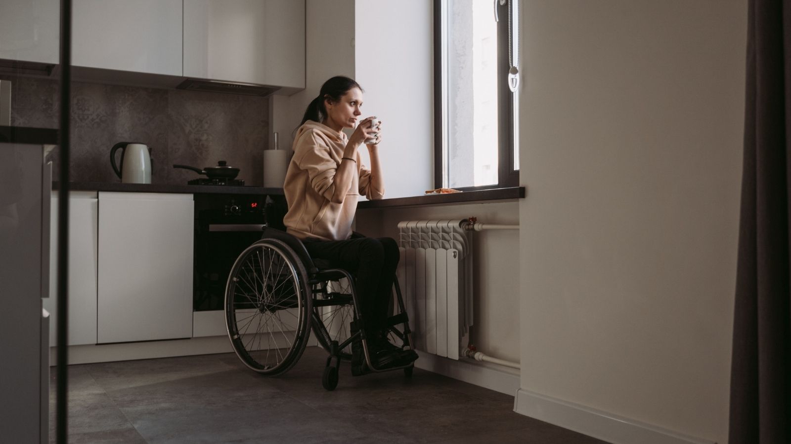 She Accidentally Knocked Over Her $22 Cocktail—Then Her Husband Turned a Celebration into a Public Humiliation Campaign Woman in a wheelchair thinking about her husband