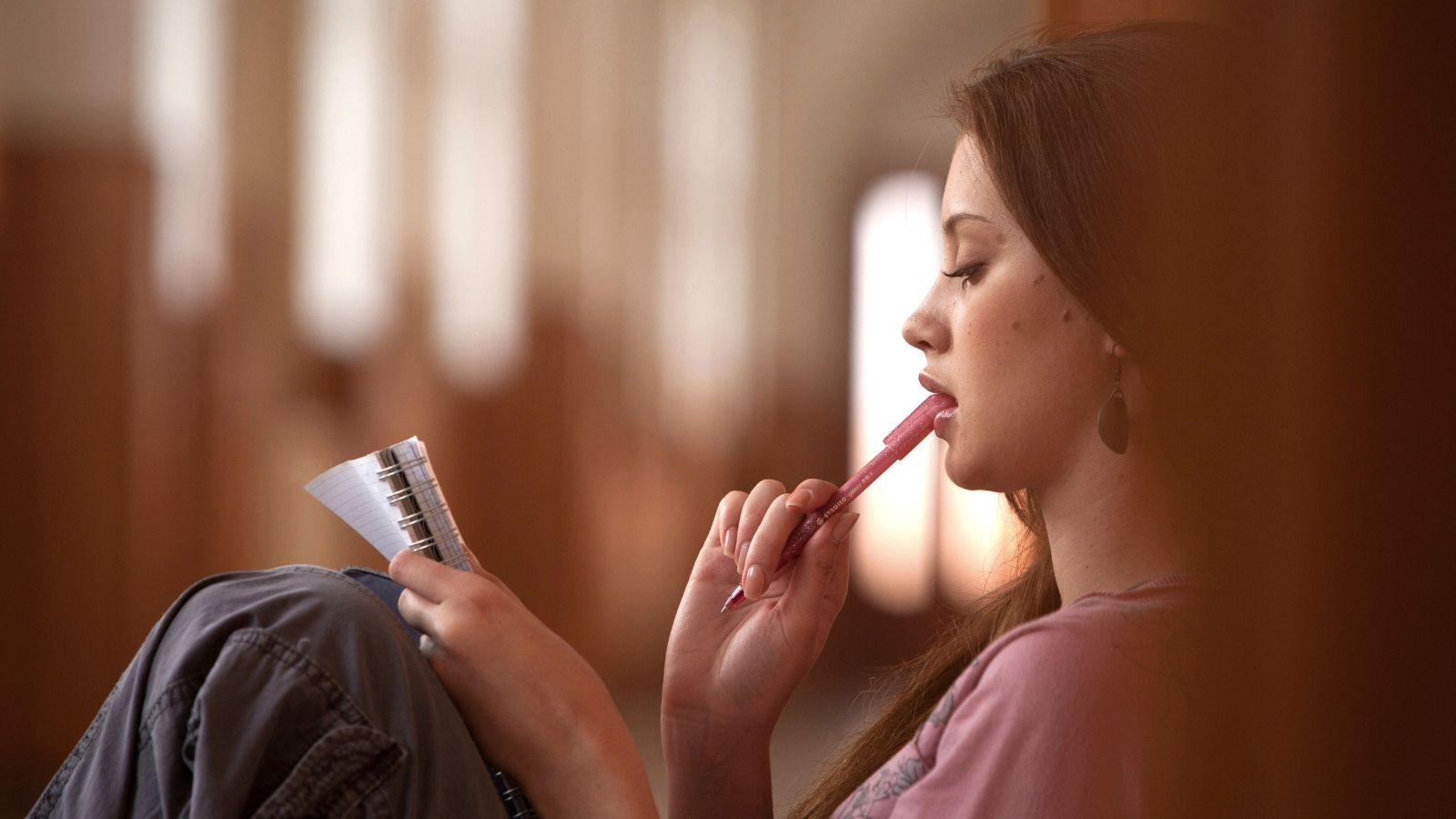 Woman making a list of all the things her mom has done