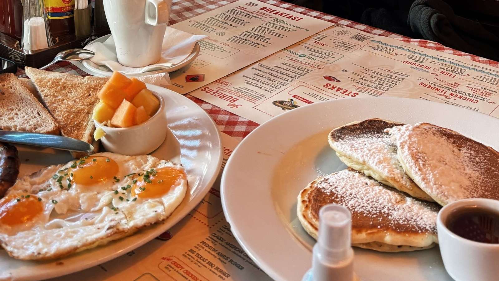 He Offered To Pay For His Usual Breakfast, But His Brother In Law Insisted On Treating Everyone — Then Complained He Ordered One Of The Priciest Meals Large breakfast sitting on a diner table