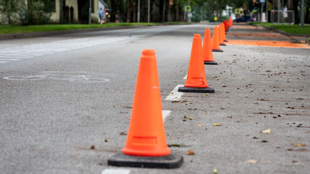 orange traffic cones in the street