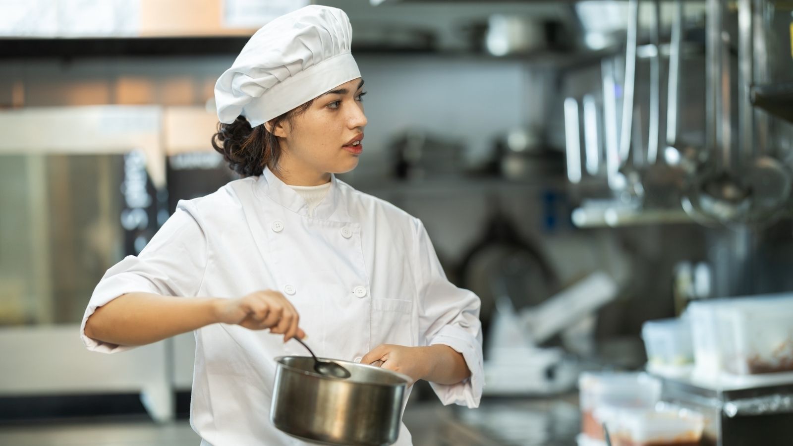 female chef in a professional kitchen