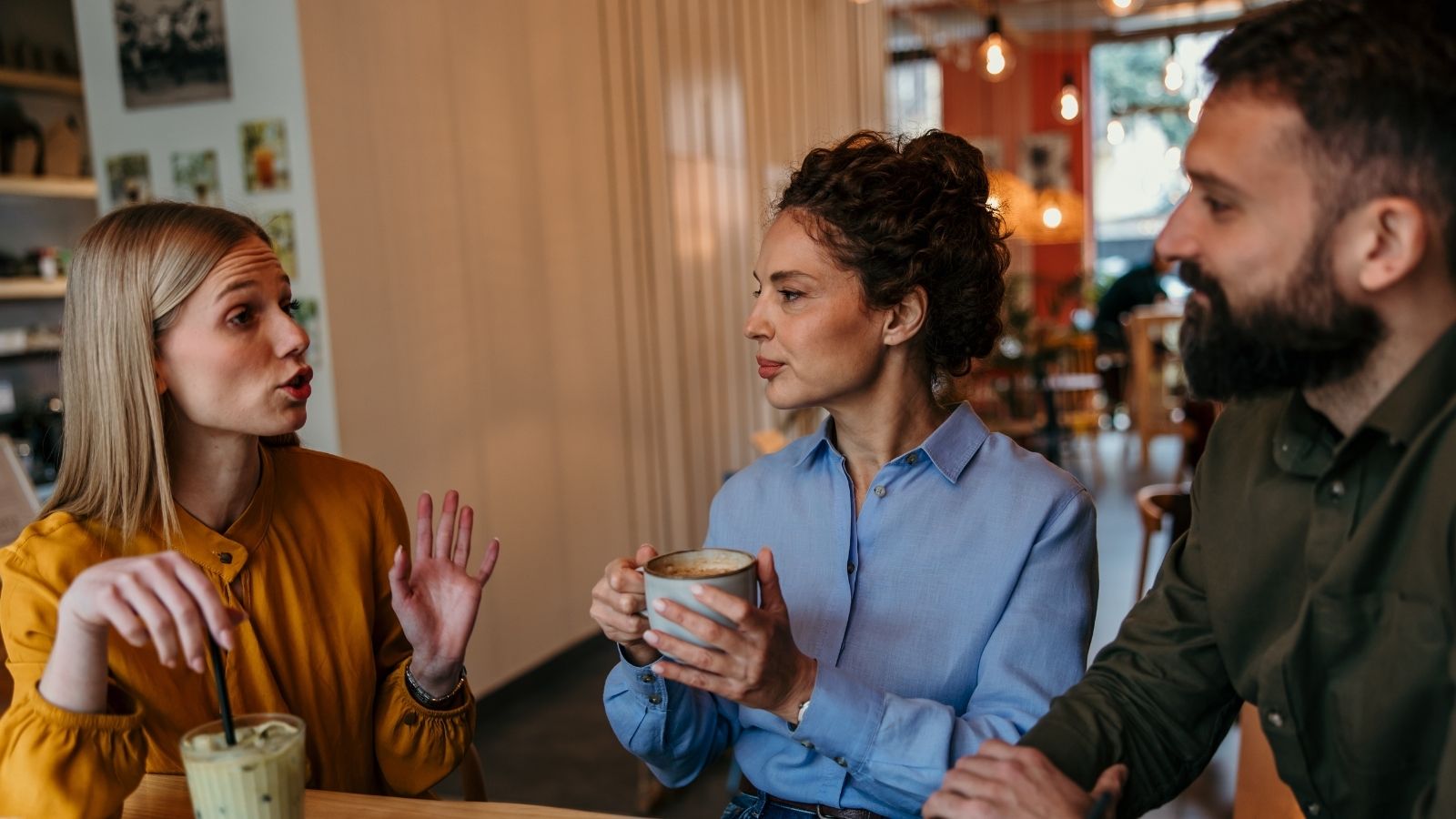 woman telling a story while two people listen