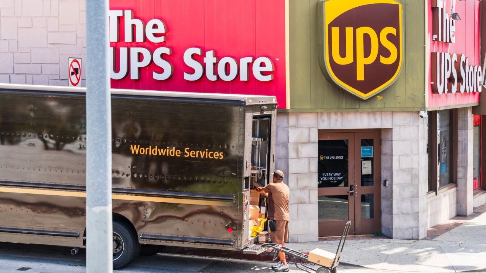 UPS delivery driver loaded a truck in front of a UPS store