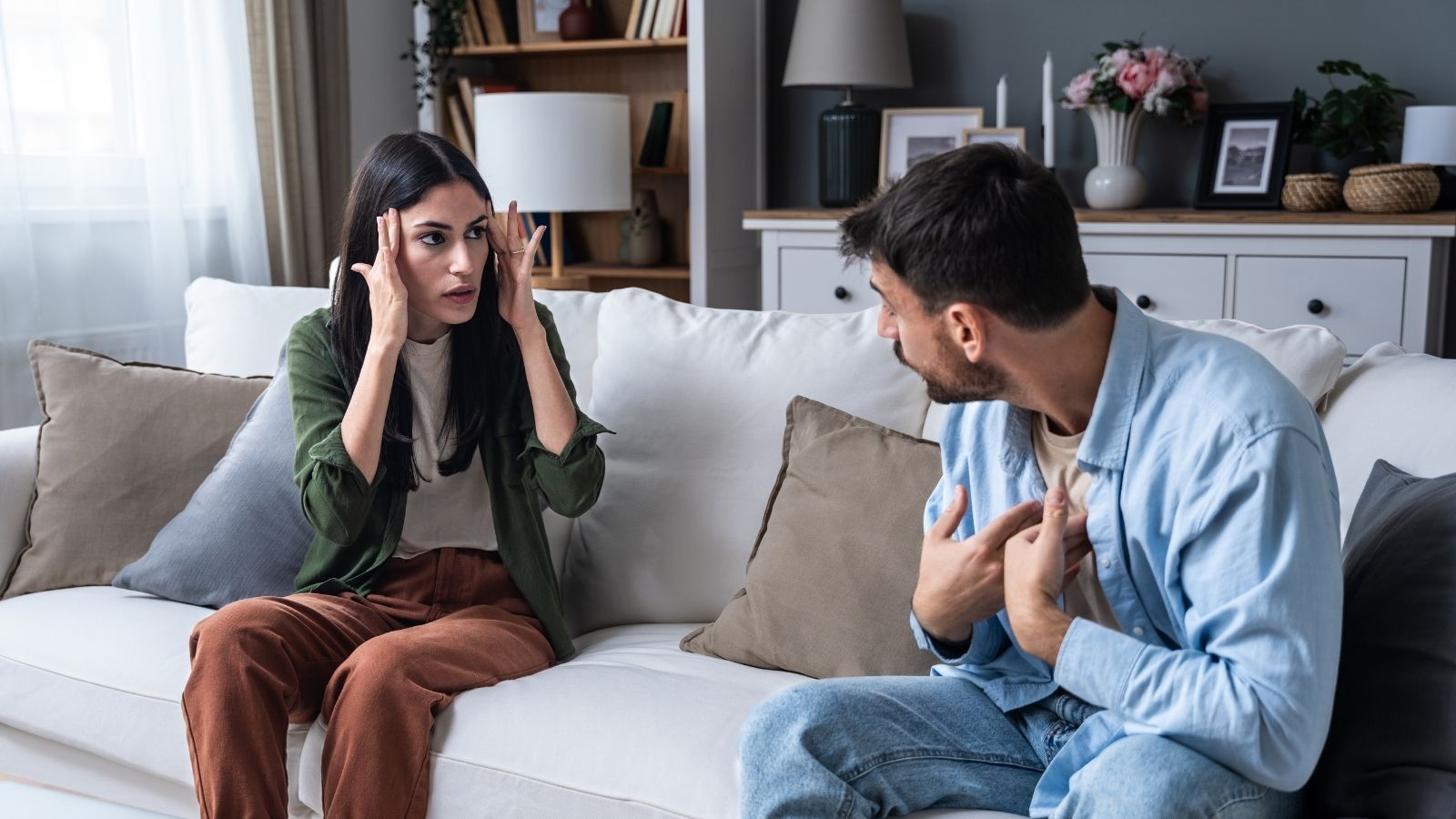 Roommates Agreed To Ask Each Other Before Having Overnight Guests, But One Retaliated After Being Told No man and woman arguing