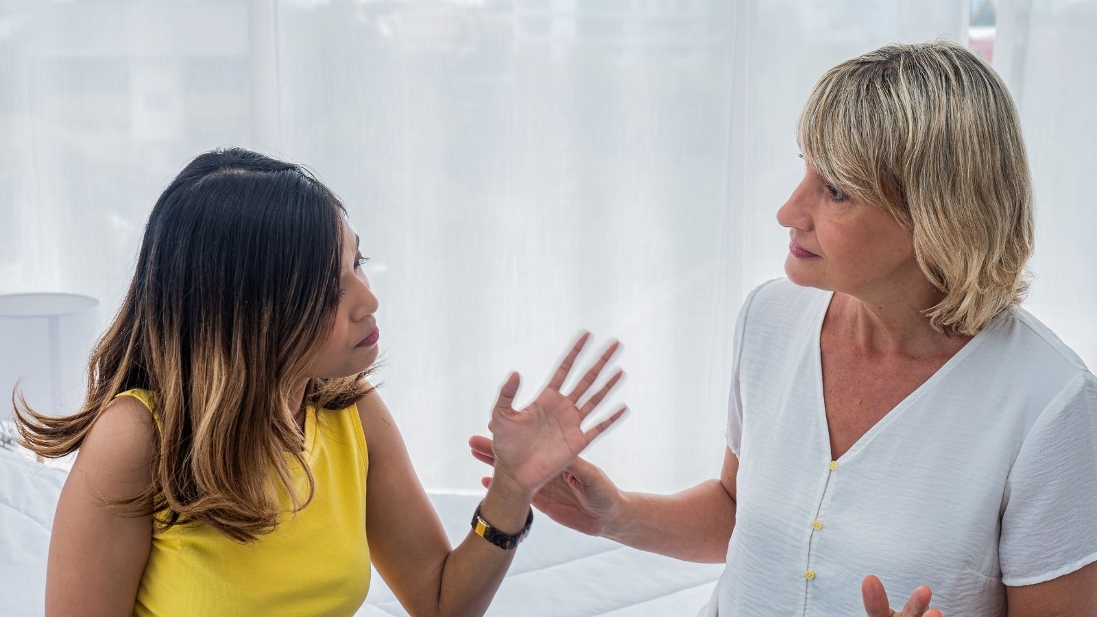 Her Mom Wants Her To Give Up Her Trip Savings So She Can Fix Her Teeth Instead young woman arguing with her mom