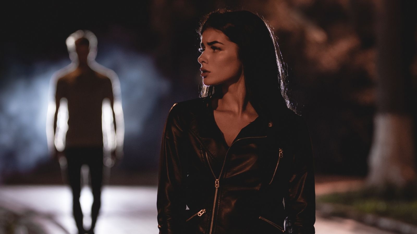 He Likes Nighttime Walks — But His Neighbor Was Frightened When He Walked Up to Her House in the Dark man walking towards a woman at night