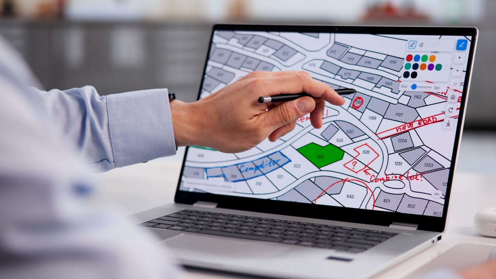 He Wants To Build A Fence On His Own Property Line — His Neighbor Is Aggressively Claiming Its Actually Hers land surveyor looking at a map on a computer