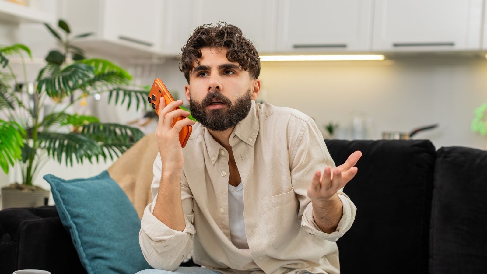 Mans Neighbor Acts Like He Owns The Apartment Hallway, So He Calls The Landlord And Police upset man talking on the phone