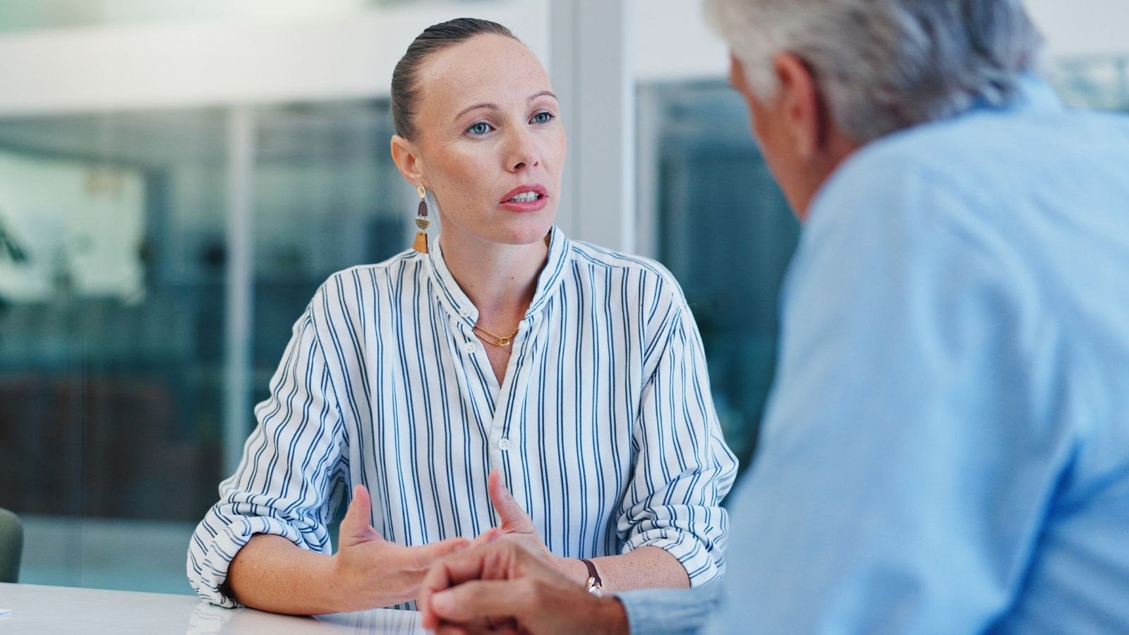 HR Told Him To Take A Month Off To Recover — He Soon Realized It Was A Trick, And Hed Actually Been Fired HR lady talking to older male employee