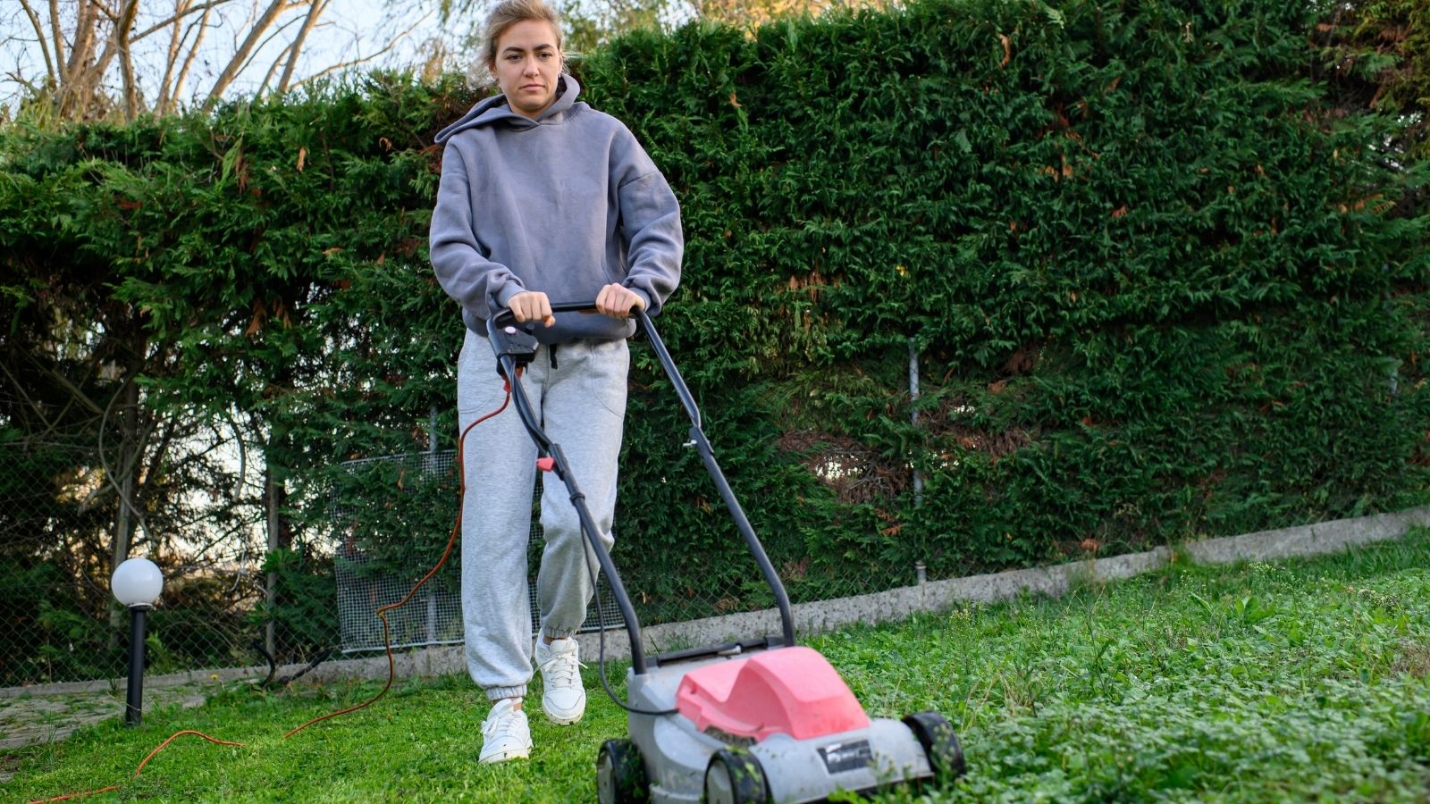 A Cyclist Passed Her Home Every Time She Stepped Outside—So She Set Up a Timestamped Telemetry and Pattern Audit woman mowing the lawn
