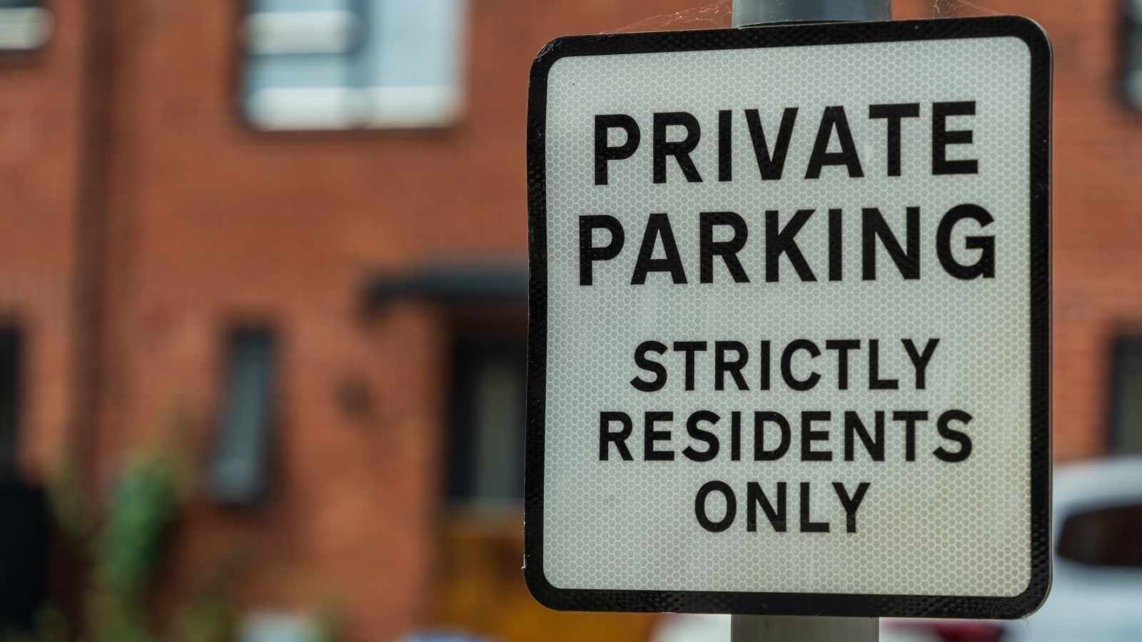 Her Sick Neighbor’s Caregivers Constantly Blocked Her Assigned Parking—Then She Handed the HOA Board a Towing Audit and Legal Notice sign that reads "private parking strictly residents only"
