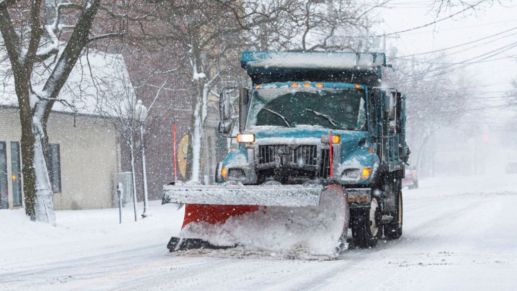 snow plow clearing the roads