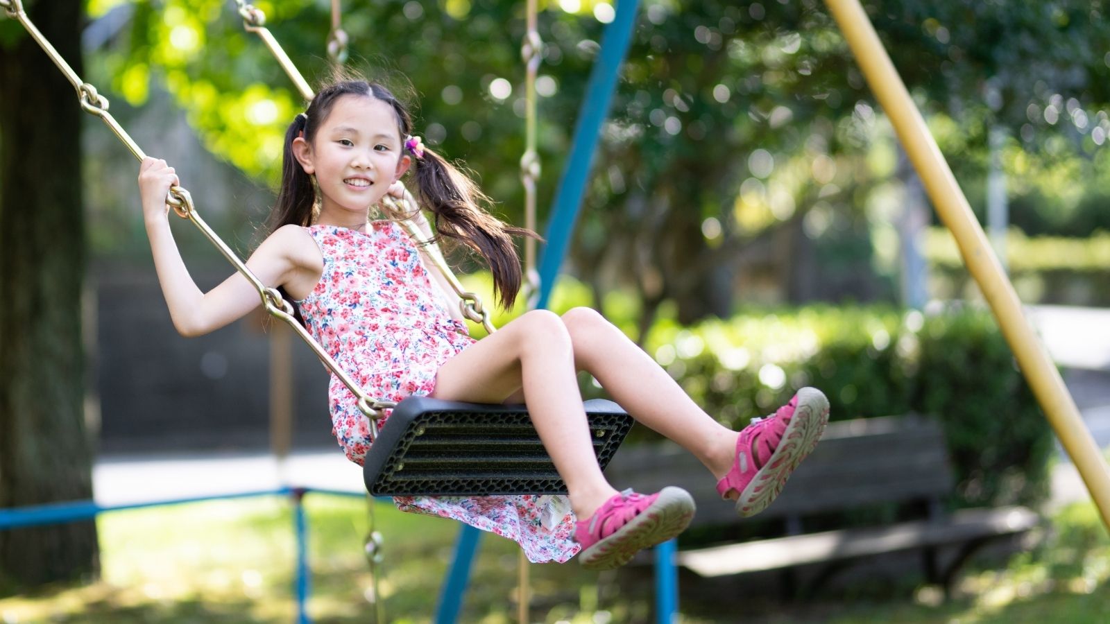 Parents Let Their Kids Play Outside, But Their Neighbor Is Upset That She Cant Walk Down The Sidewalk little girl on a swing