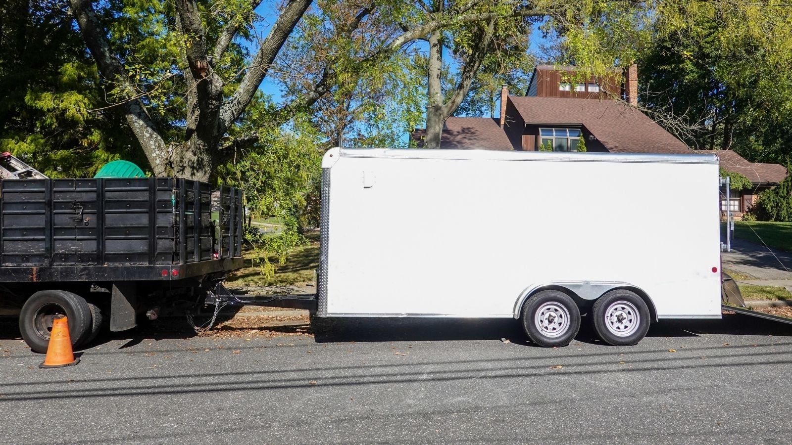 landscaping truck parked on a residential street