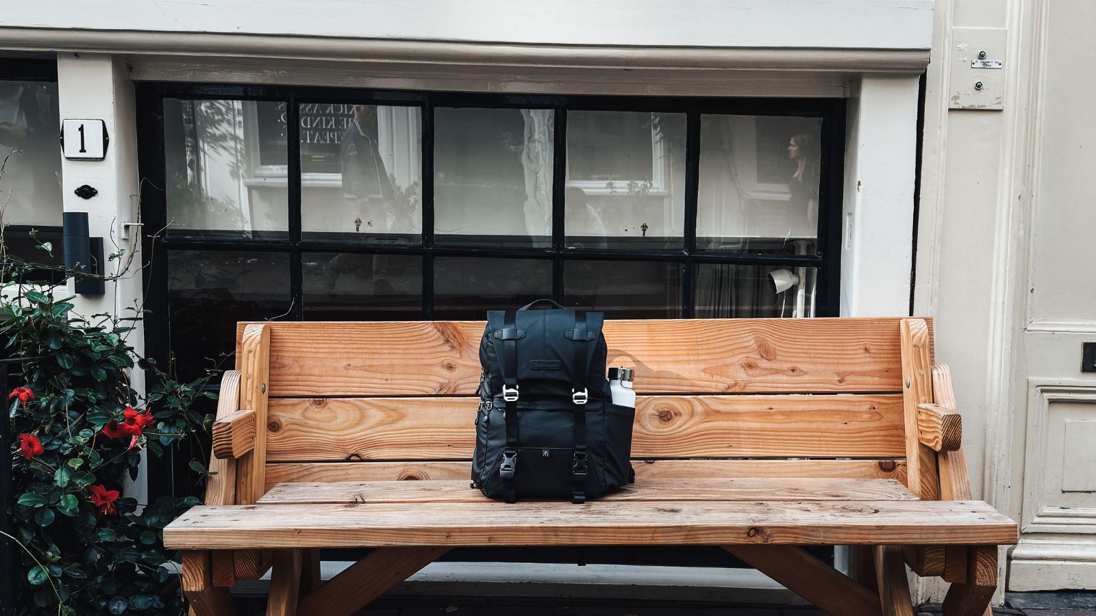 He Asked His Friend Not to Bring a Roach Infested Backpack Inside—So the Friend Blew Up and Vowed Never to Return Unattended black bag sitting on a bench outside the house