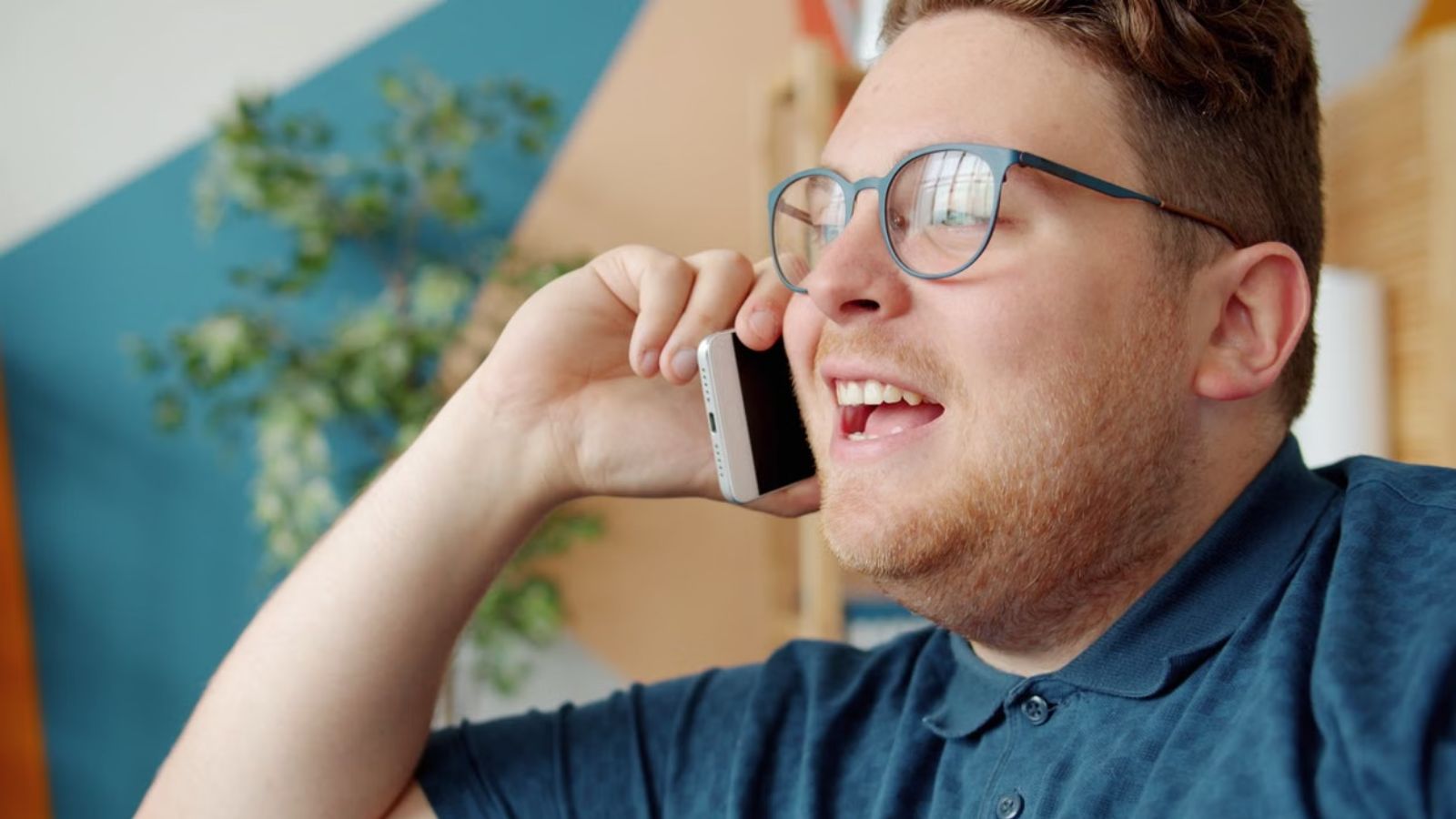 Man Moved Into a Cheap Apartment—But He Quickly Learned Why the Rent Was So Low Man talking on the phone