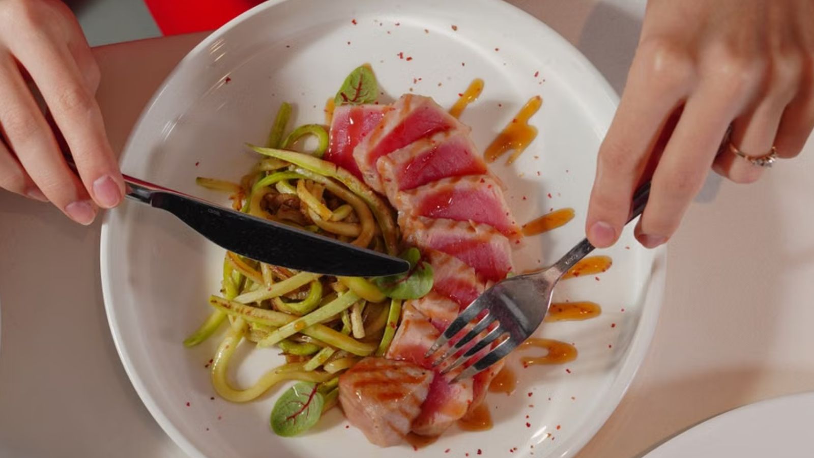 Woman Is Tired of Her Coworker’s Daily Diet Updates—But She’s Worried Asking Him to Stop Would Sound Rude Person eating a healthy plate of food