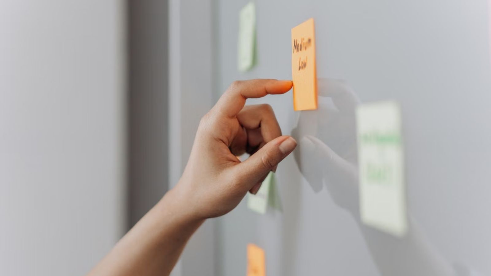 He Followed the Labs Documents Policy to the Letter — Even Making Sure Post It Notes Counted as Official Records Person pointing to a sticky note on the board