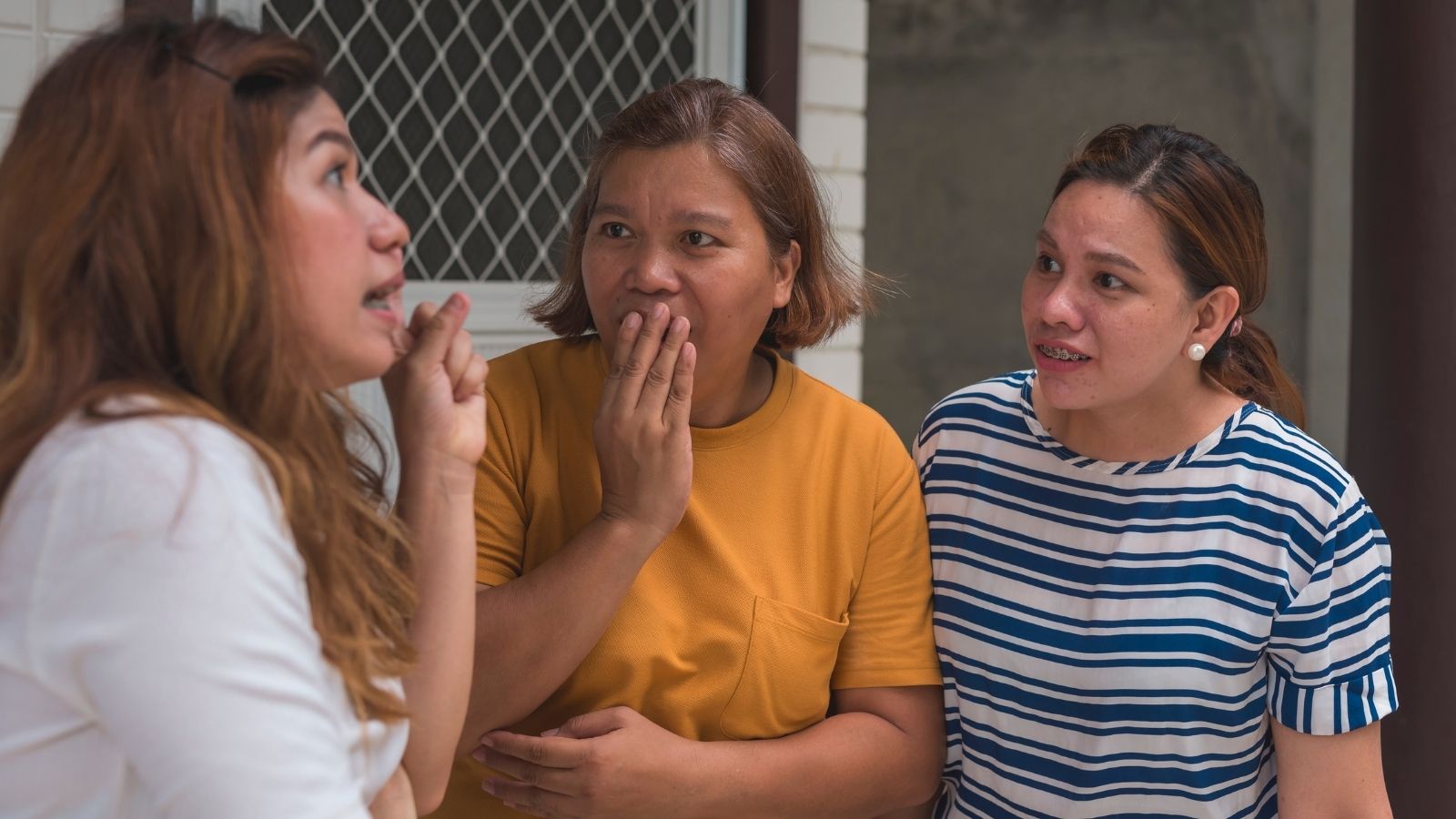 She Inherited Her Great Aunts House—Then Noticed the Neighbors Constantly Watching Her Every Move three women gossiping outside