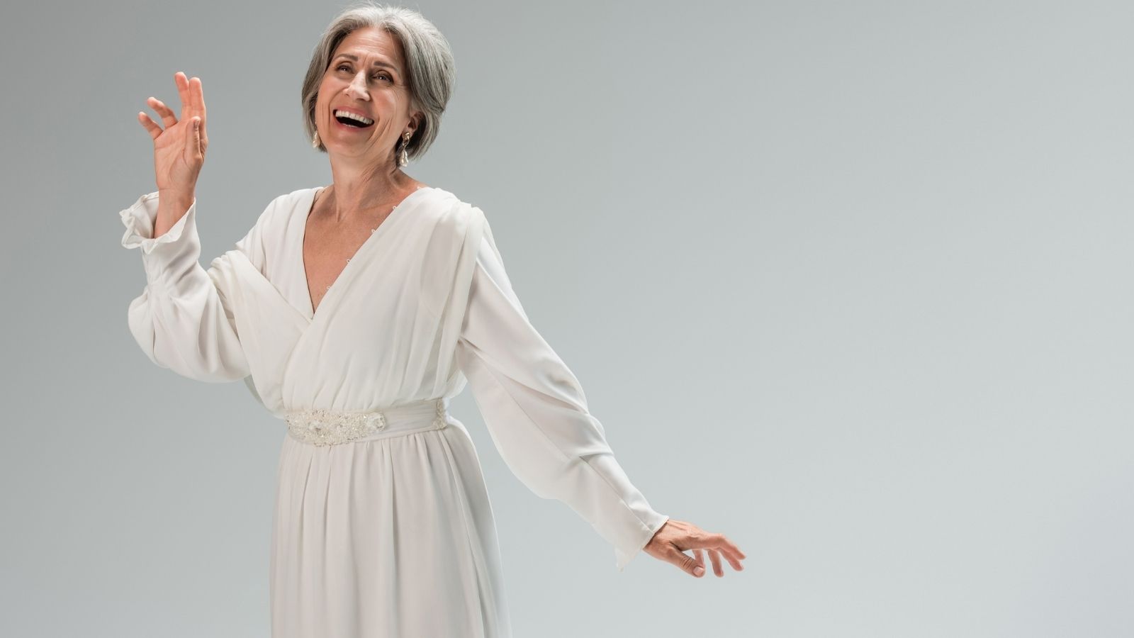 She Wore White to Her Sons Wedding — Her Family Planned to Ruin the Dress in Response older woman wearing a white dress