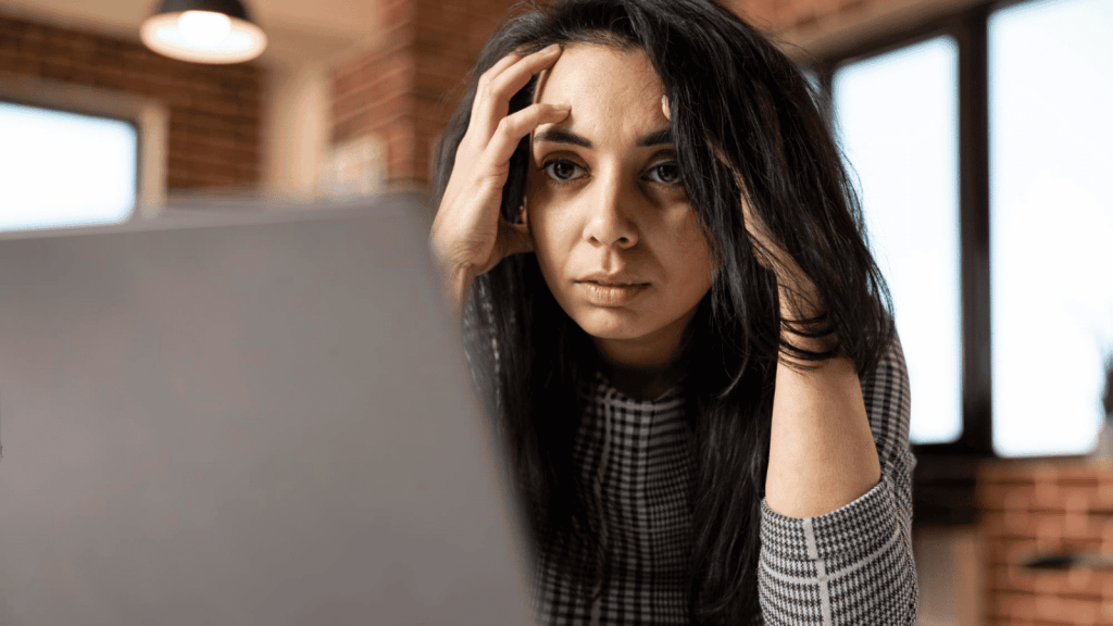 Stressed woman at work