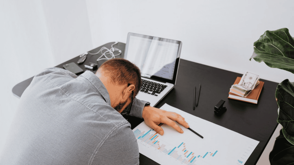 Man tired at his desk job