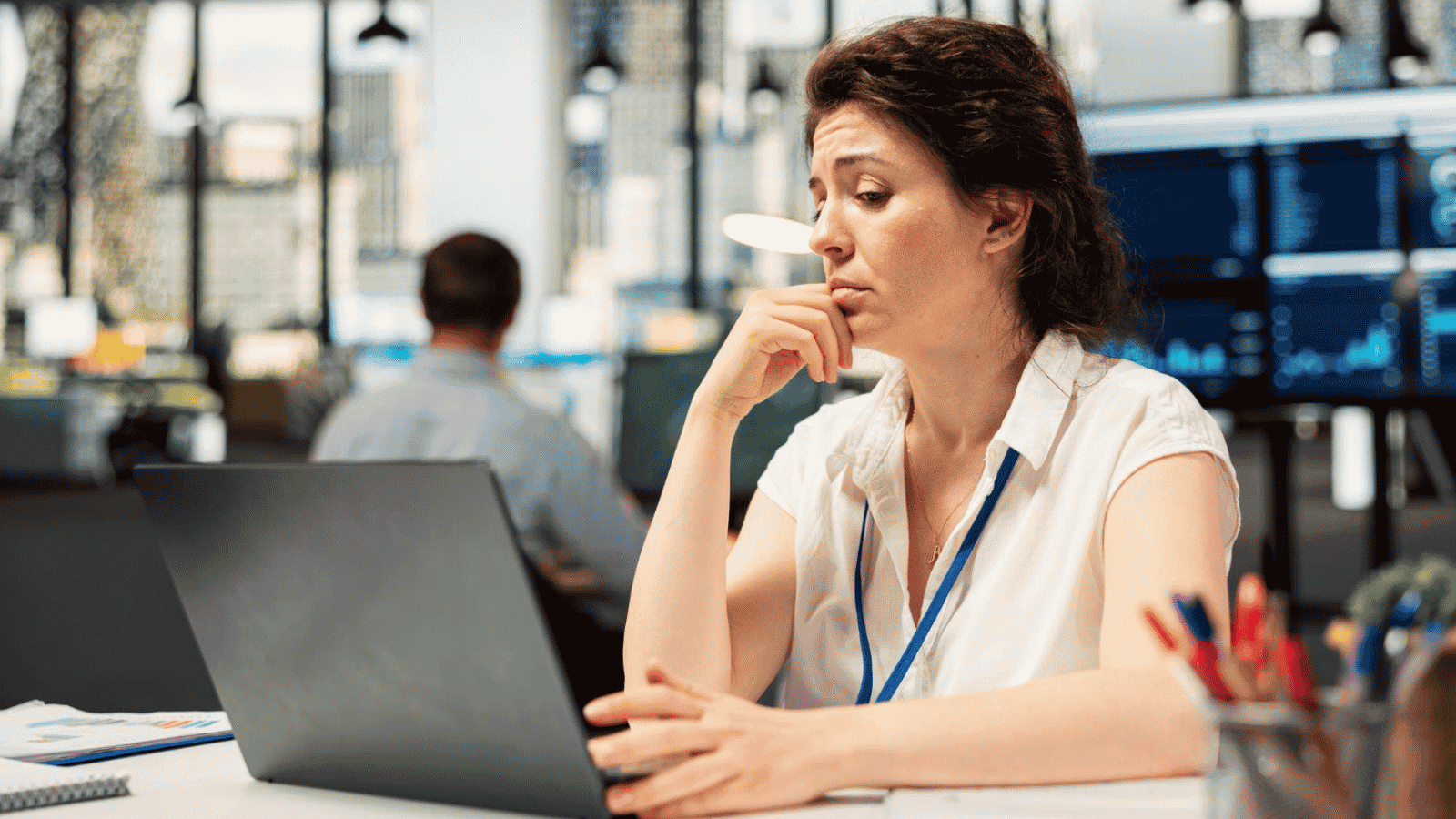 Woman confused using a laptop