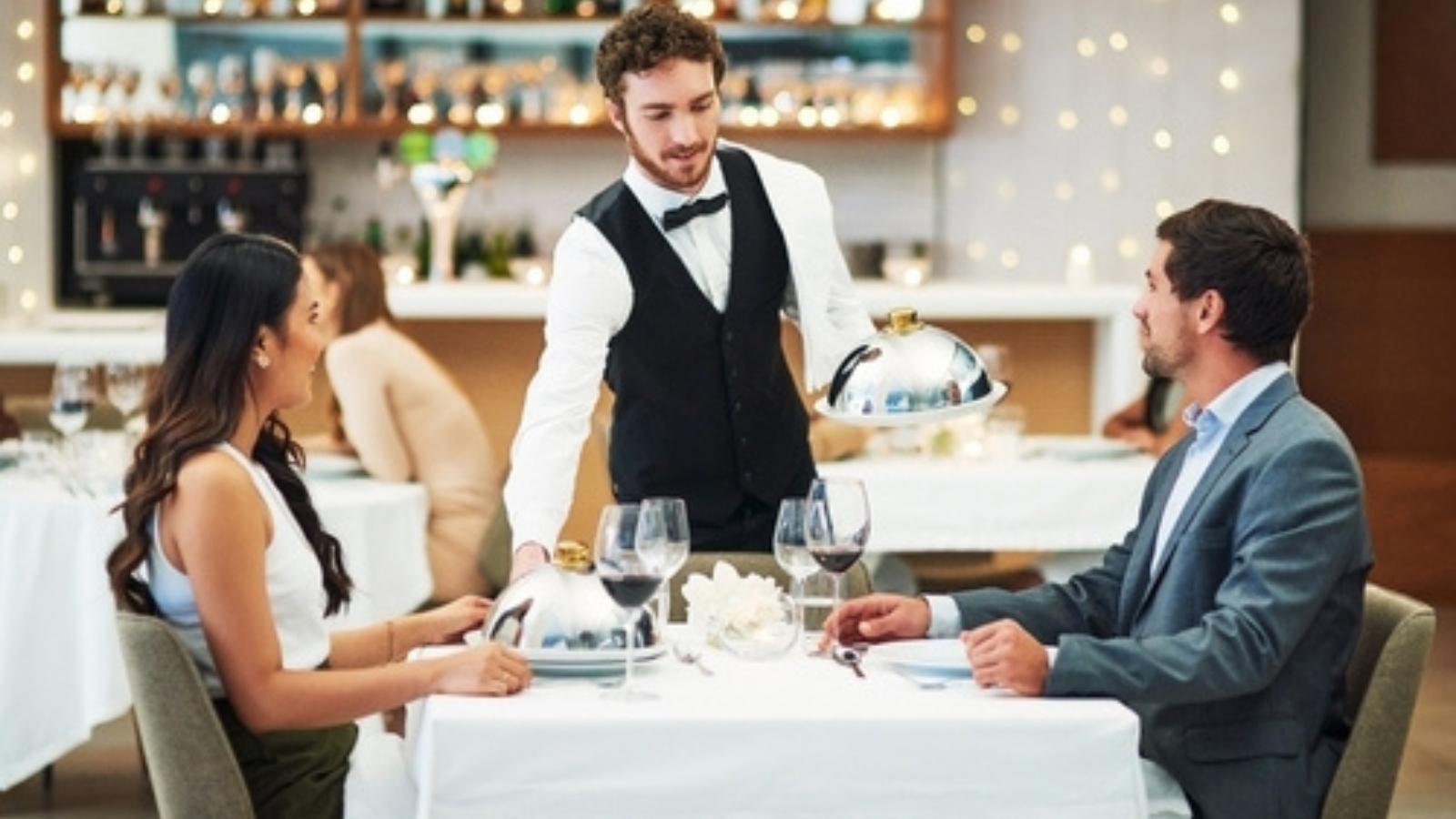 A Guest Ordered The Sea Bass Special, But When The Bill Came, He Was Furious His Server Never Mentioned The Price Waiter at restaurant