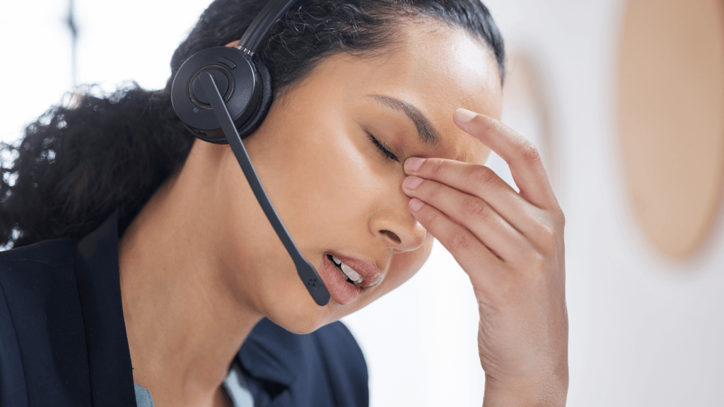 Woman tired at customer support job