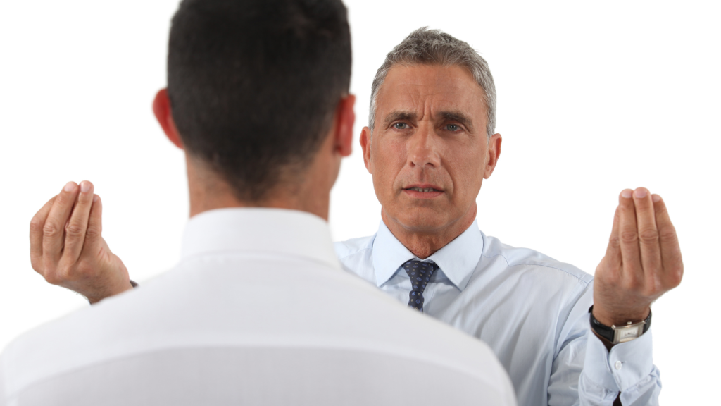 He Already Has a Medical Appointment Scheduled — His Boss Is Still Trying to Talk Him Out of the Time Off annoying boss talking to frustrated young man employee