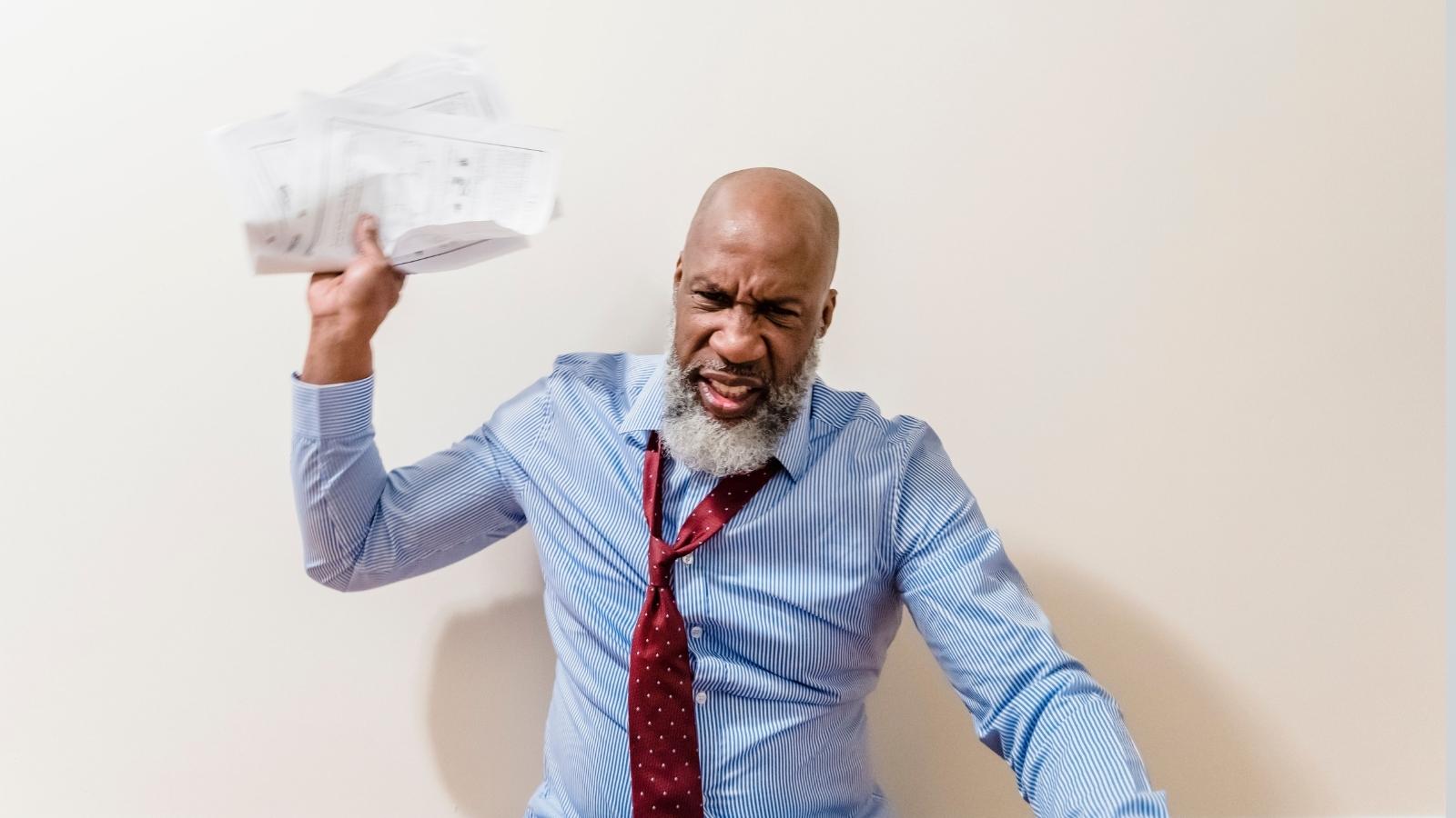 Employee Was Shocked When His Boss Denied A Coworkers PTO After A Family Loss, So He Started Considering A New Job bad boss throwing papers down