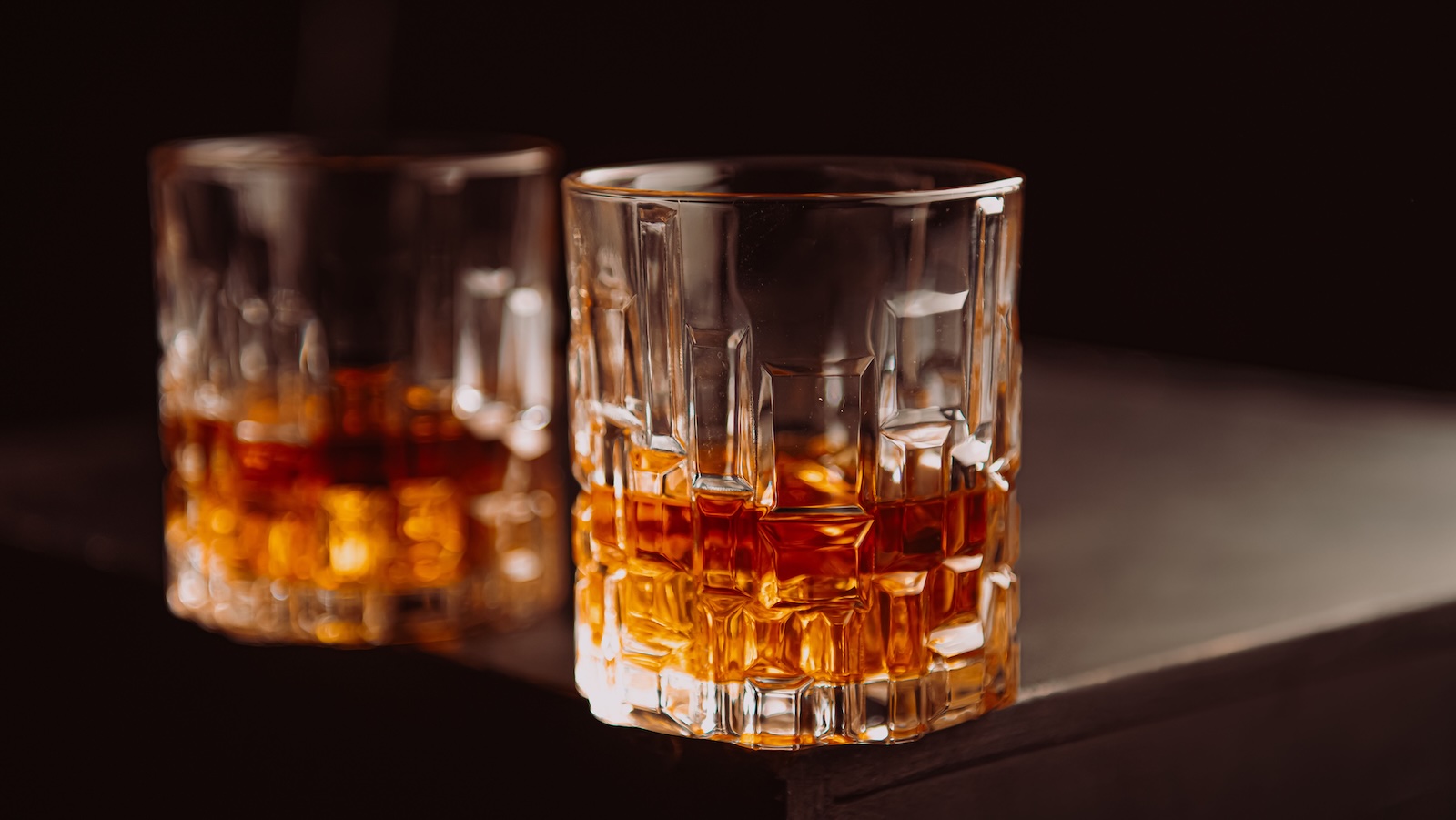 She Scored a $700 Bottle of Bourbon for $100 — Now Her Brother in Law Says Its His bourbon in two glasses