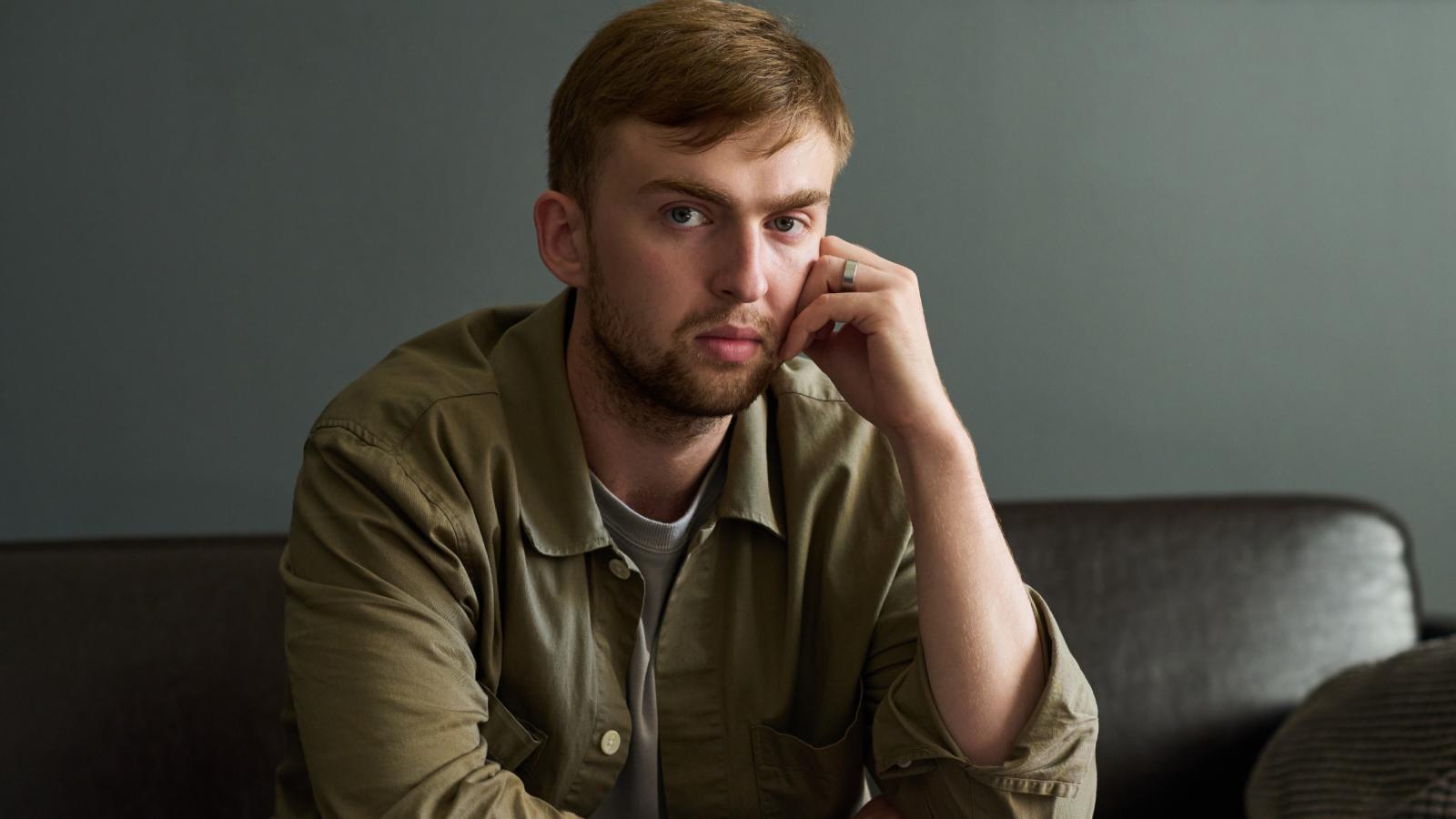 man sitting on a couch