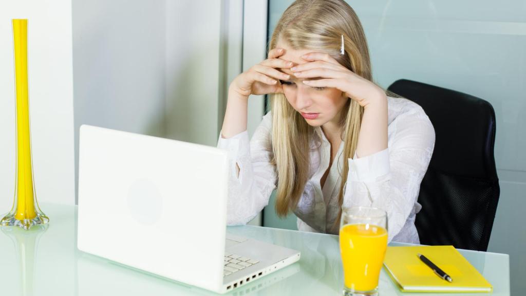 young woman stressed out at work
