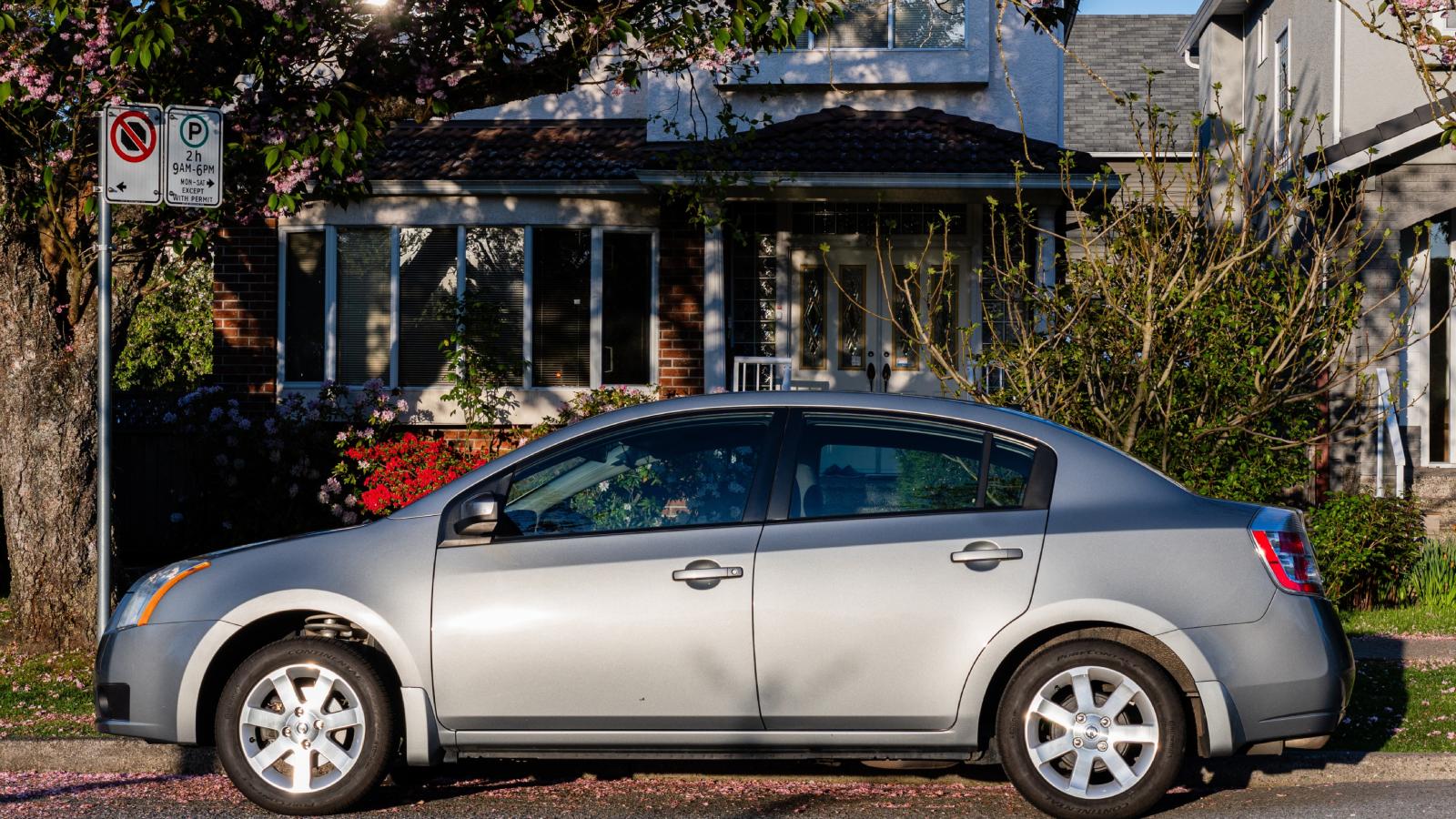 Man Parks in Front of His Neighbor’s House While Doing Renovations—But His Neighbor Isn’t Happy About It car parked in front of a house