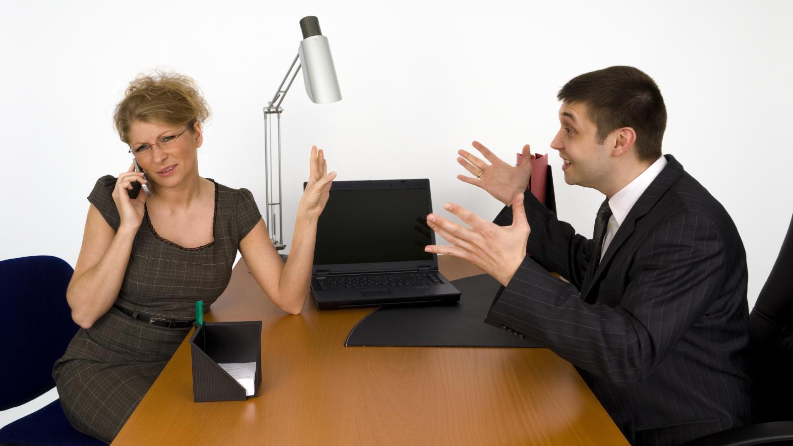 Man Mentored A New Co Worker When She Started, But She Removed Him From A Project After Becoming His Manager two workers in an office