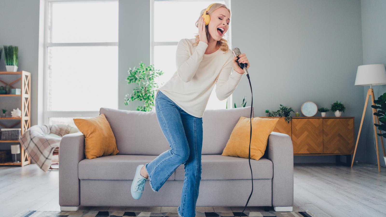 woman singing in an apartment
