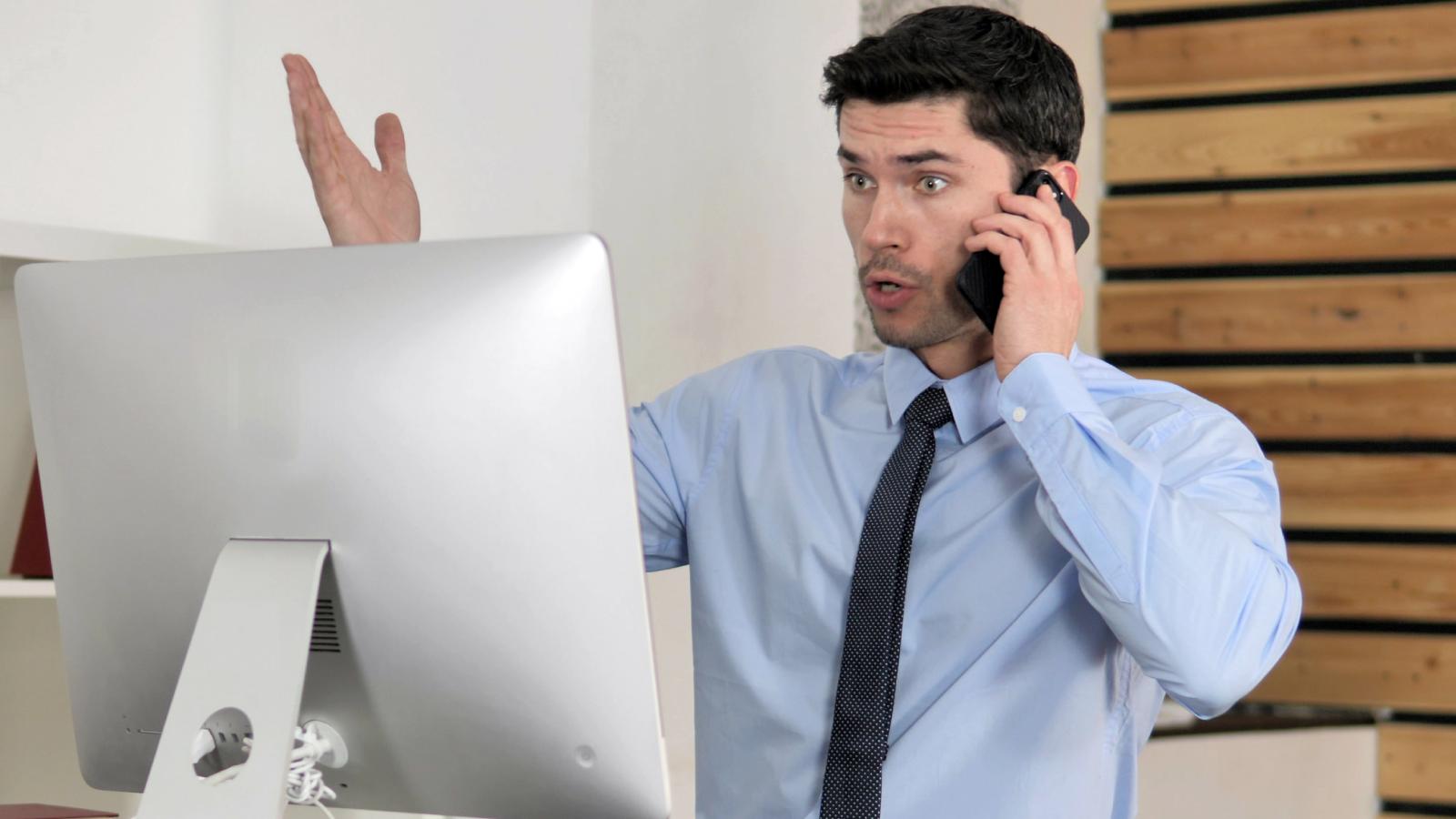 He’s Working More Hours Than He’s Getting Paid For—And He’s Starting to Wonder How Much More He Can Take man looking at a computer screen
