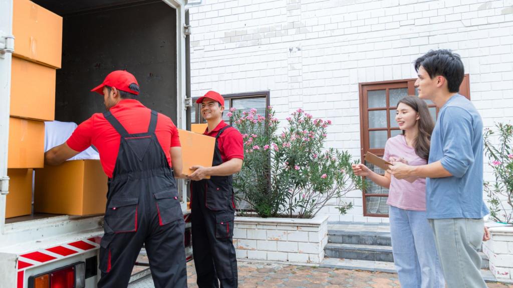 workers packing a moving truck
