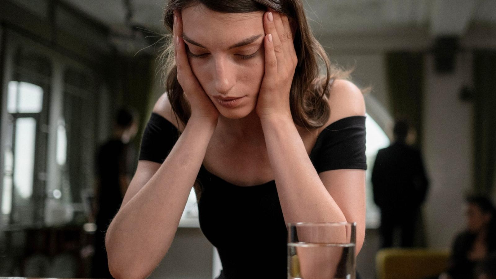 She Was Named After Her Great Grandmother As An Honor — Now She Wants A Name Of Her Own distressed woman in black