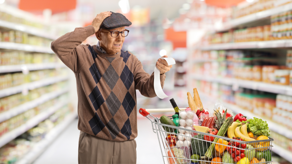 She Asked For Help Covering Their Aging Fathers Groceries, But Her Brother Blew Up Instead Of Stepping Up elderly man with shopping cart looking confused